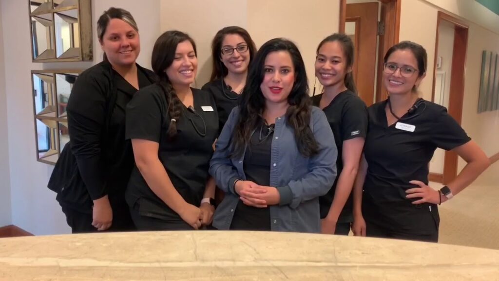 Group of female employees at Wichita Family Dental, representing the dedicated and skilled team.